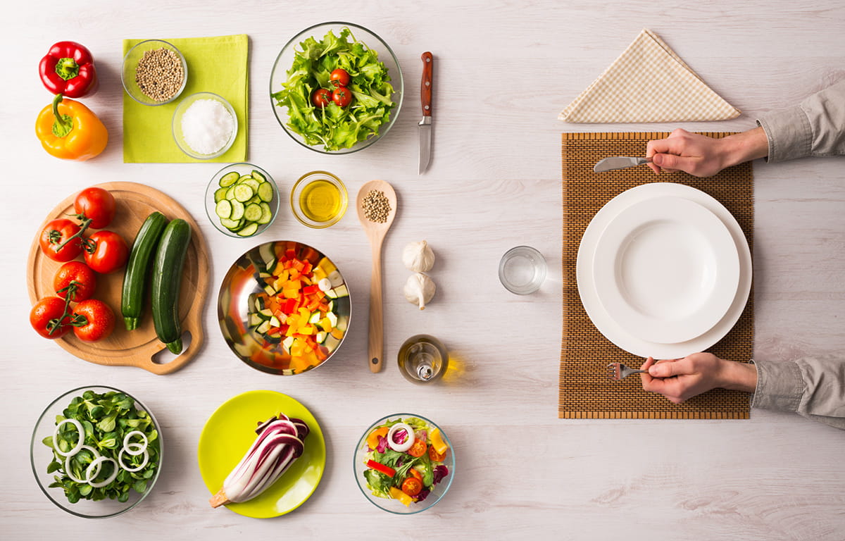 person with empty plate and lots of food - Portion versus serving