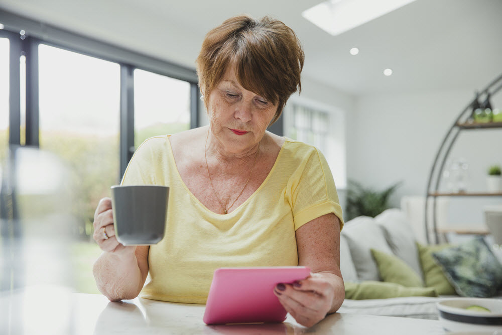 woman on her tablet