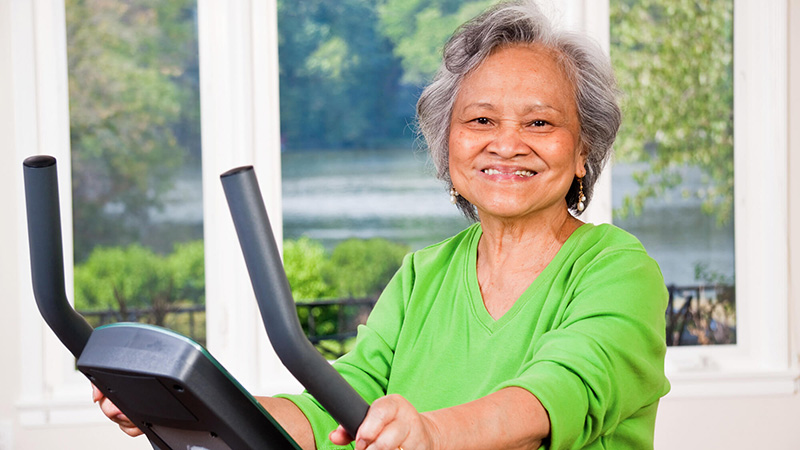 woman on exercise bike