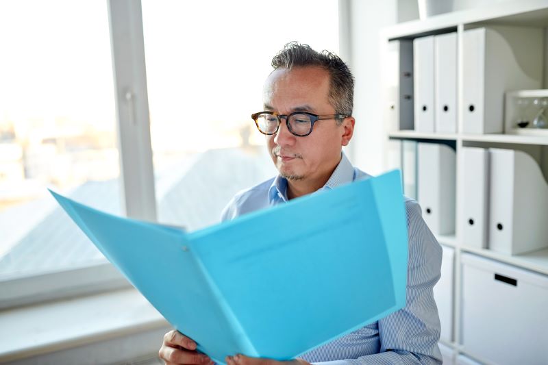 business man holding a folder