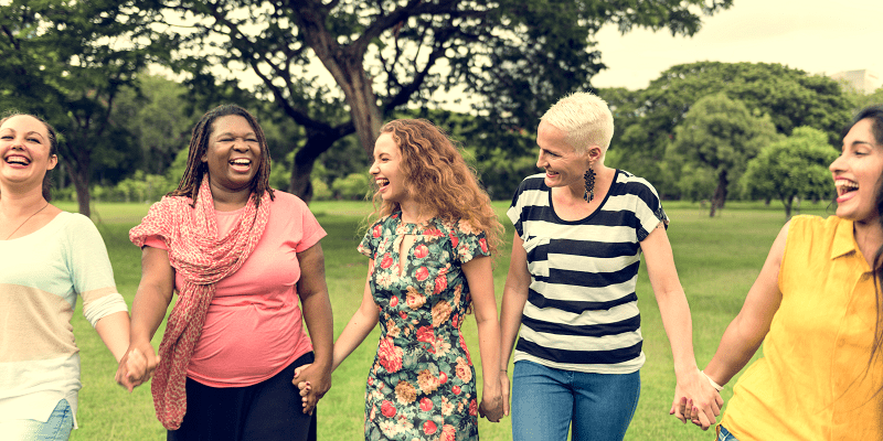 group of women socializing and happy