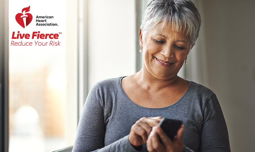 Woman touching the screen of her phone