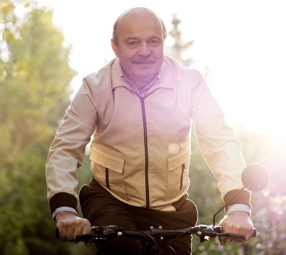 senior man riding his bike