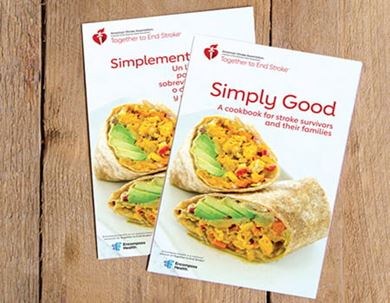 The Simply Good Cookbook and Simplemente Bueno un Libro de Recetas are laying overlapped on wood planks. The Simply Good Cookbook and Simplemente Bueno un Libro de Recetas are laying overlapped on wood planks.