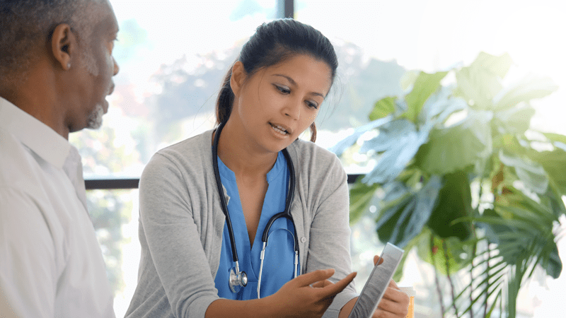 Doctor consulting with patient